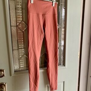 42. Size 6 LULULEMON Coral Wunder Train Leggings
